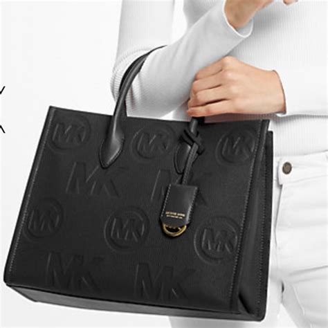 mirella medium logo embossed pebbled leather tote bag